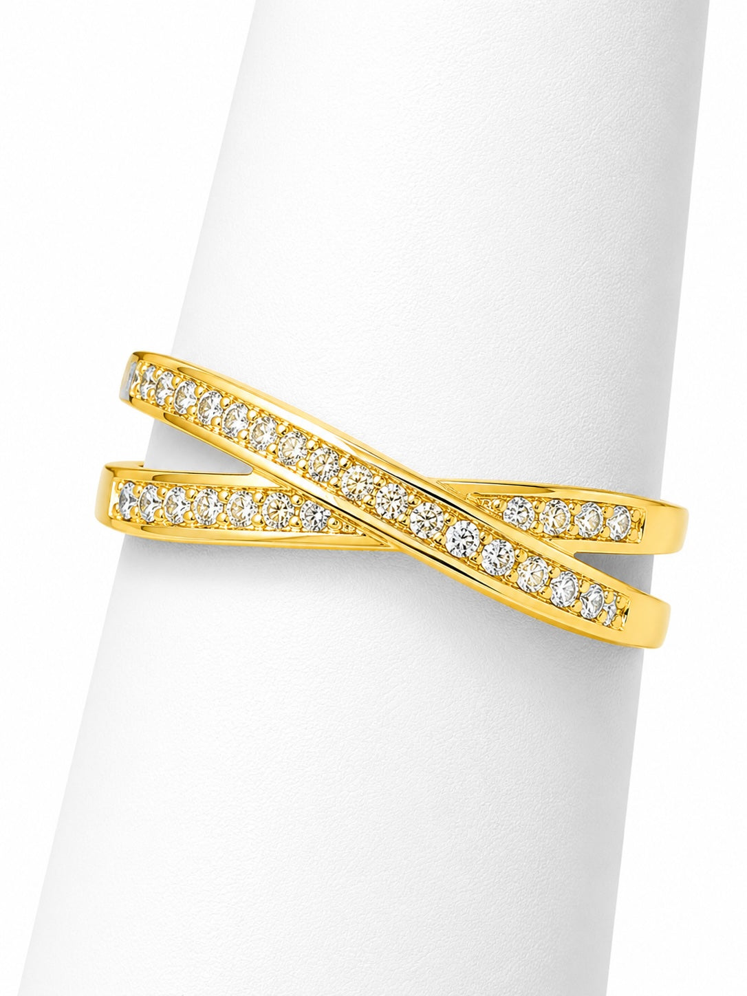 Gold ring with diamond accents on a white background