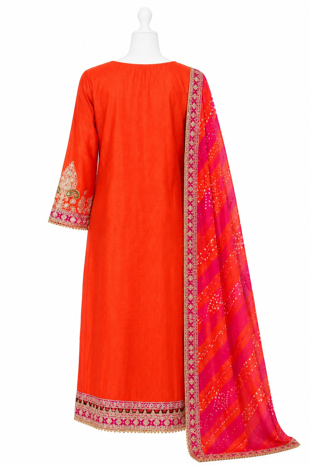 Red-orange traditional outfit with pink dupatta on a white background