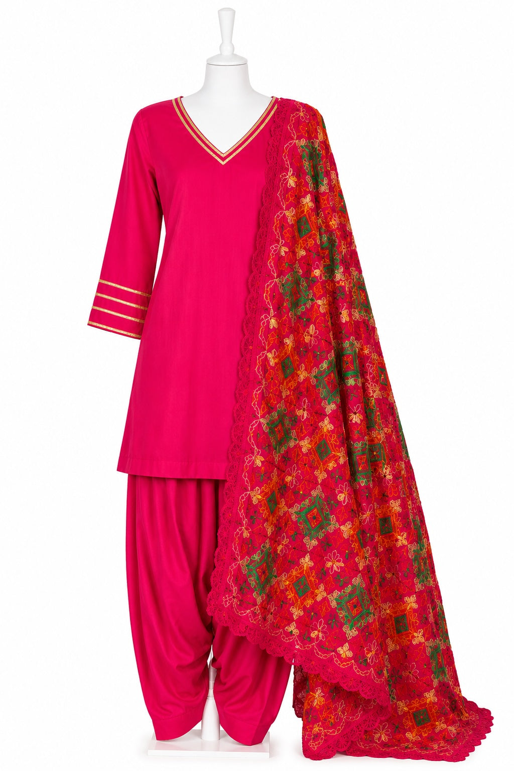 Pink traditional outfit with a red floral dupatta on a white background