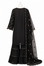 Black traditional outfit with gold embroidery on a white background