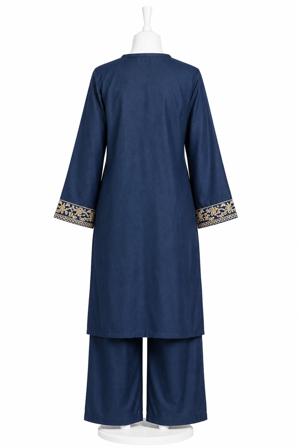 Navy blue outfit with embroidered details on a white background