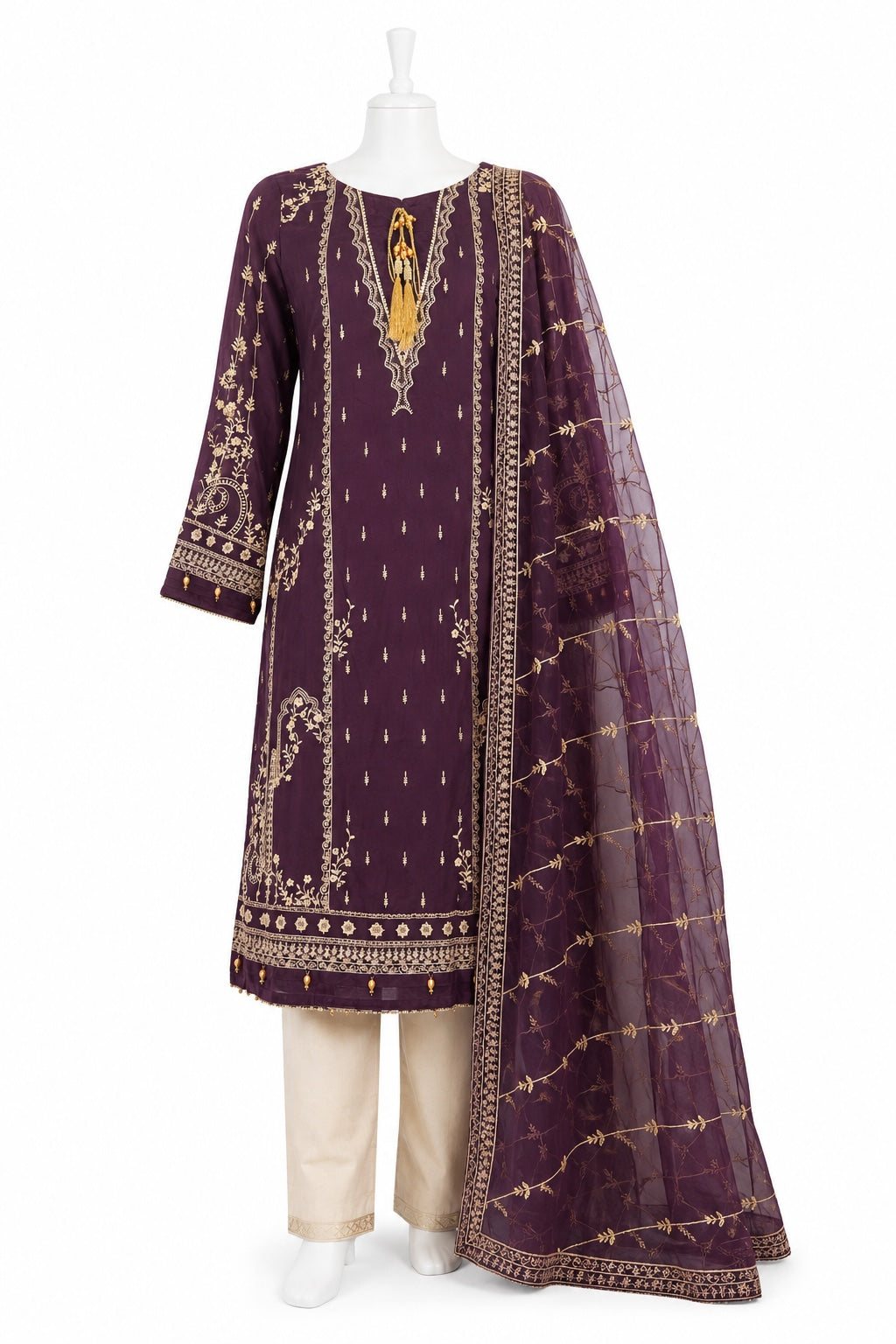 Purple embroidered traditional outfit with white pants on a mannequin against a white background