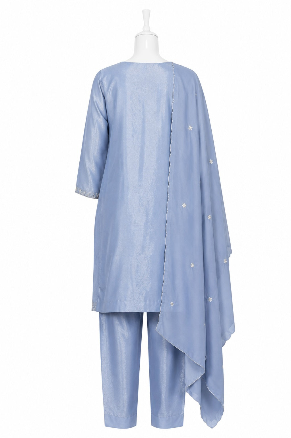 Light blue outfit with a long top and pants on a white background