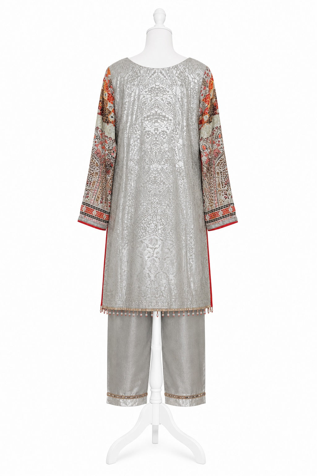 Silver embroidered outfit on a mannequin against a white background