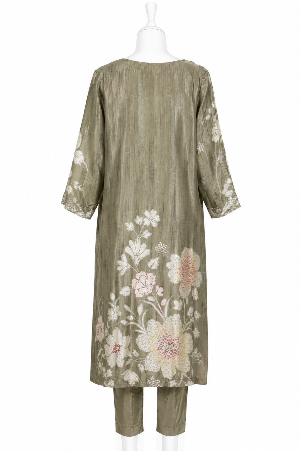 Green floral embroidered dress on a white mannequin against a white background