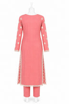 Coral pink kurta with lace details on a white background