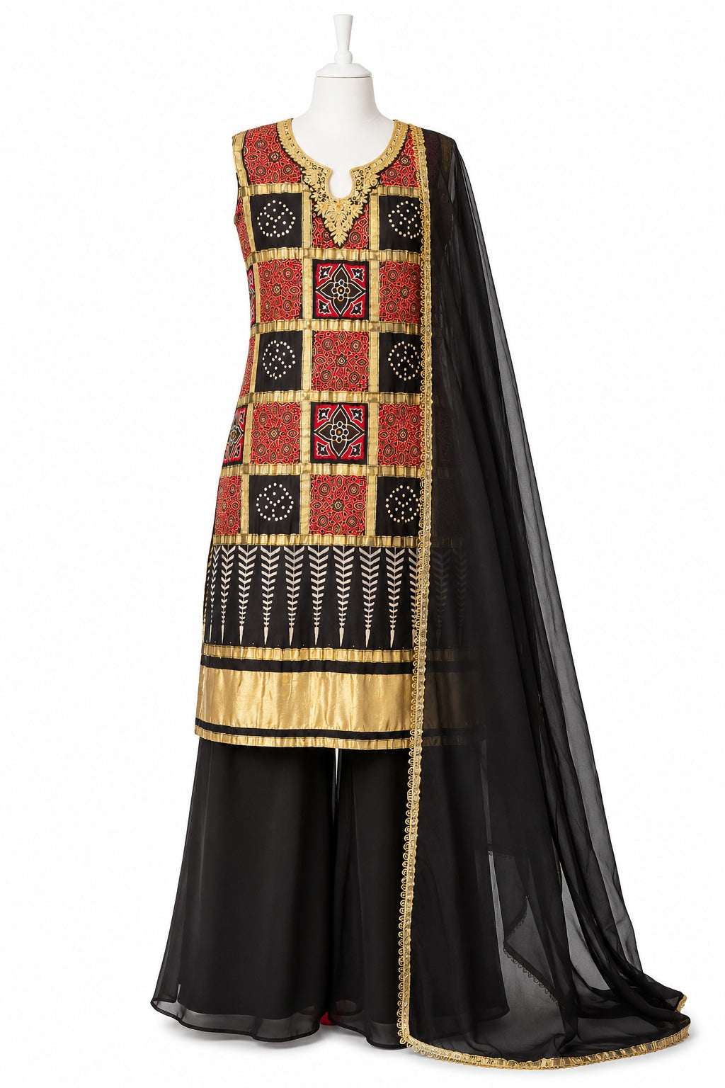 Traditional outfit with embroidered top and black dupatta on a mannequin against a white background